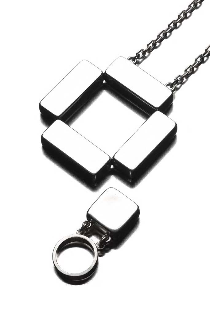 ASTRID FOG - a late 1960's silver pendant and matching ring,