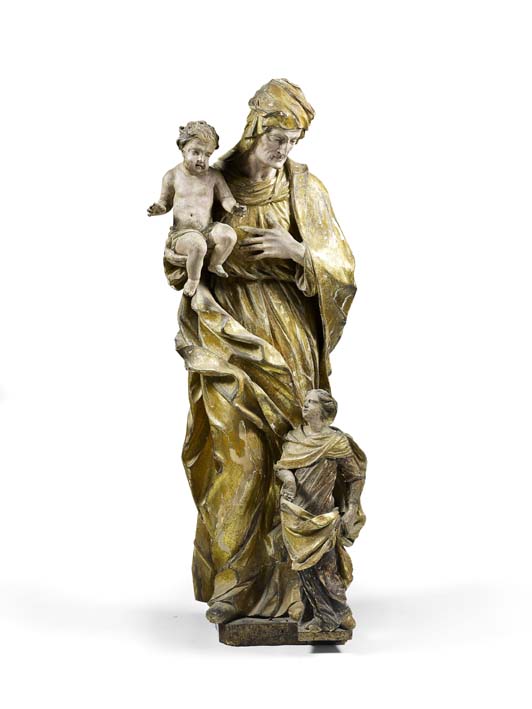 A 17th century South German carved wood and polychrome group of St Anne, the Christ Child and the Virgin