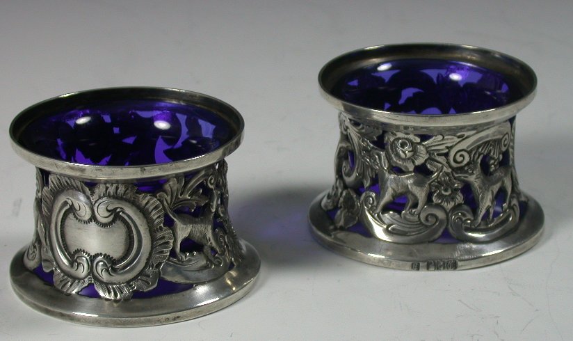 A pair of Edwardian Irish silver salt cellars in the form of dishrings