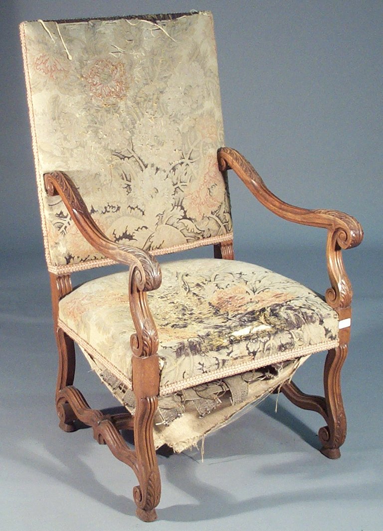 A 19th century French walnut armchair