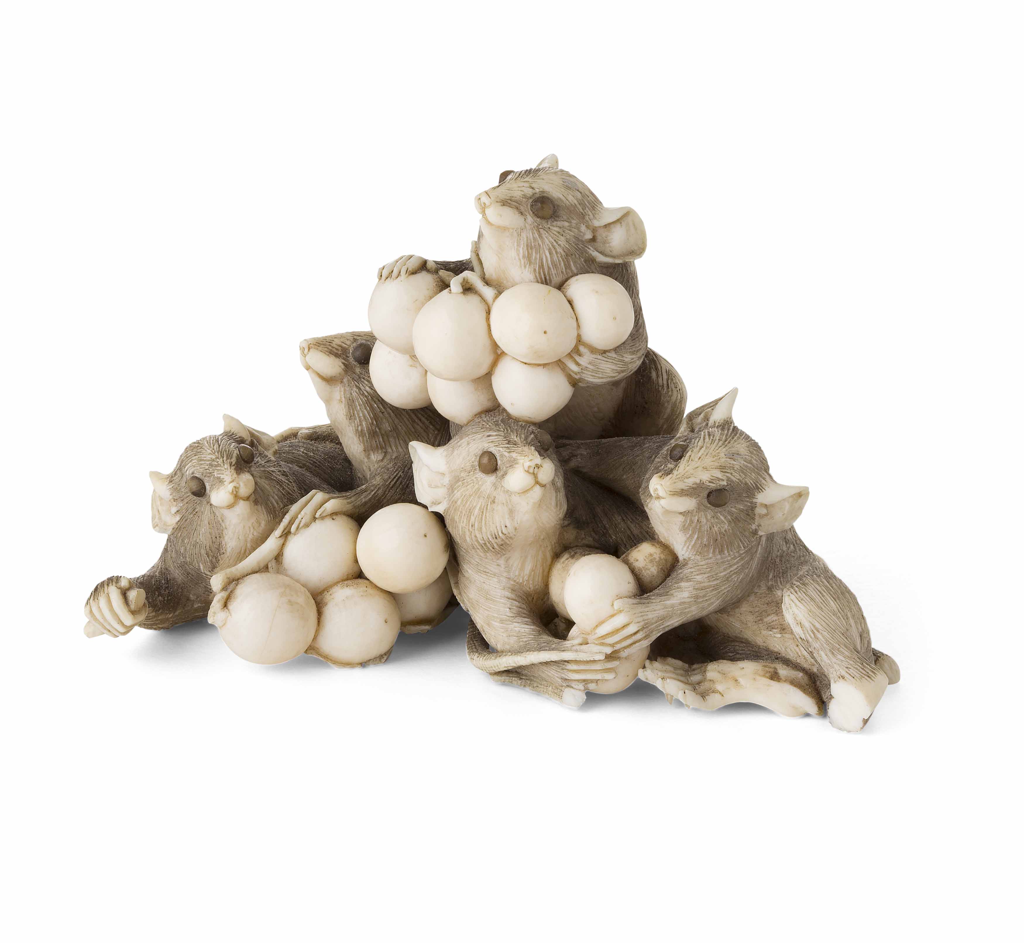 JAPANESE CARVED IVORY OKIMONO OF RATS AND GRAPES