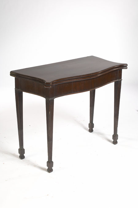 A 19th century mahogany and rosewood crossbanded fold over card table