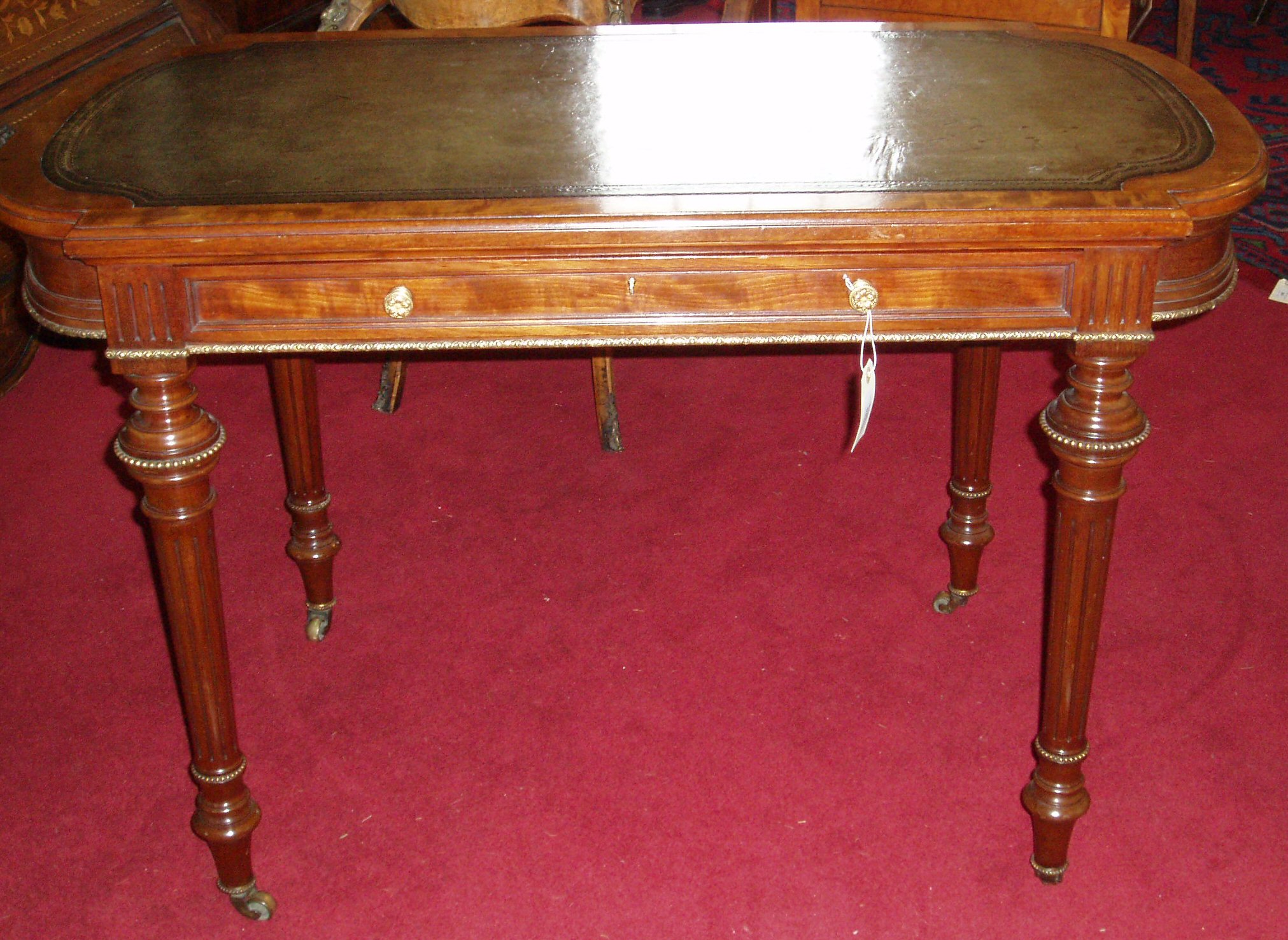 A 19th century English mahogany writing table,
