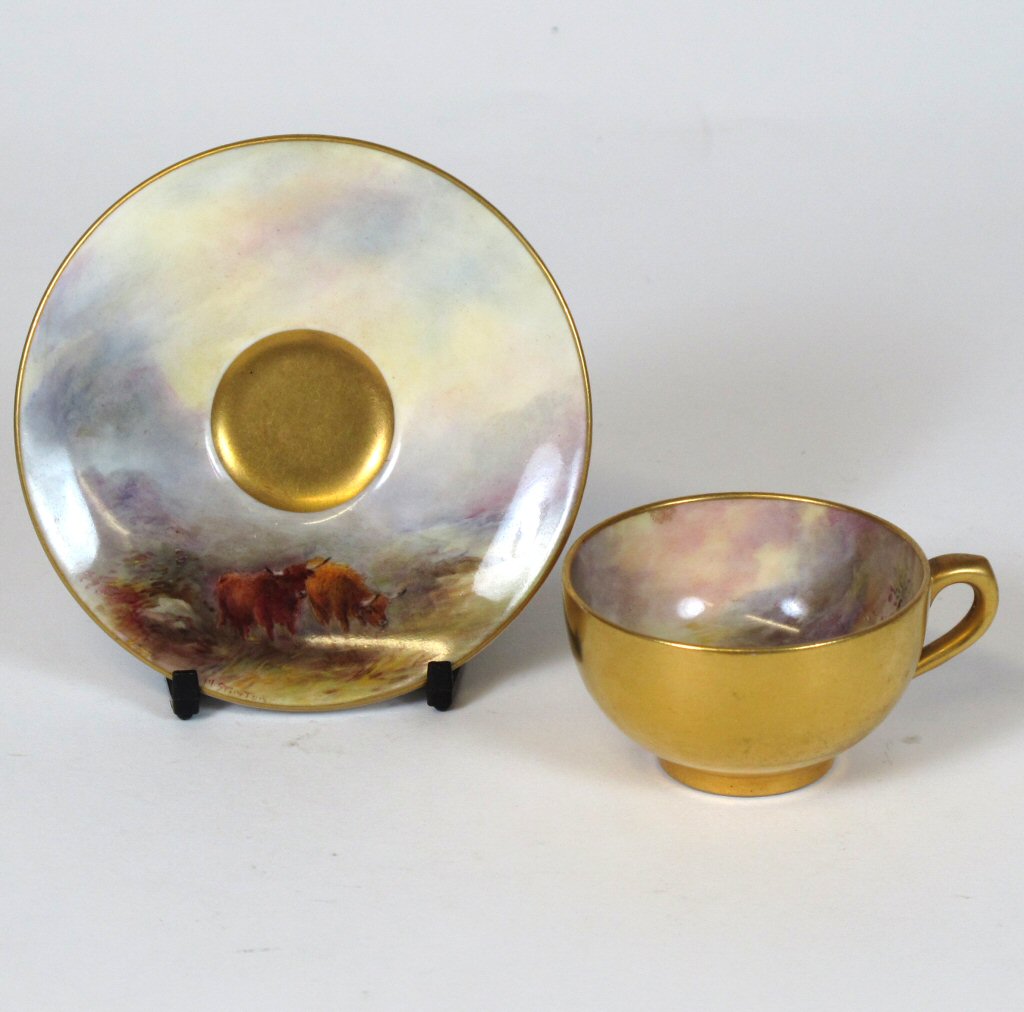 A Royal Worcester cup and saucer Painted by H. Stinton