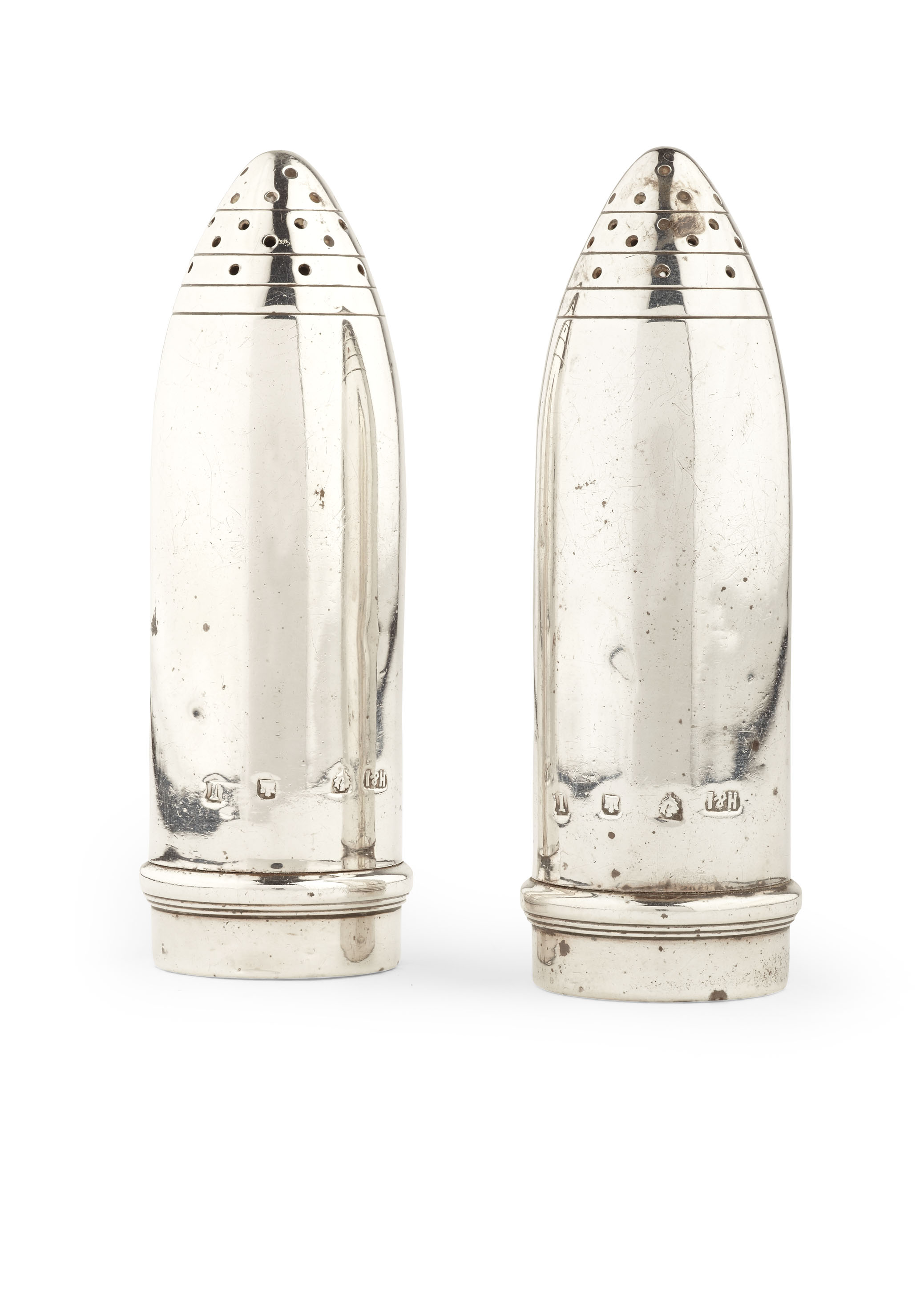 A pair of novelty artillery shell peppers