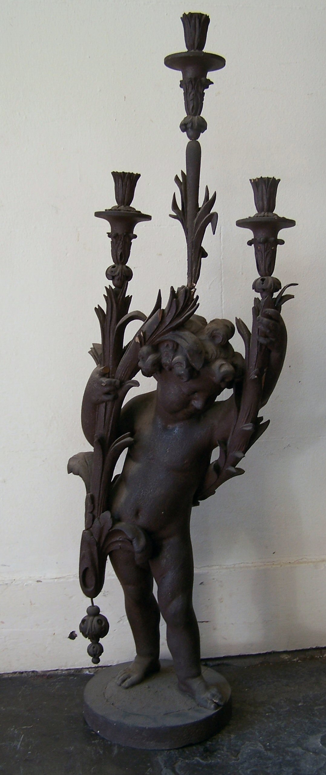 A pair of 19th century carved softwood and gesso table candelabra,