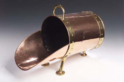 An Arts and Crafts copper coal scuttle,