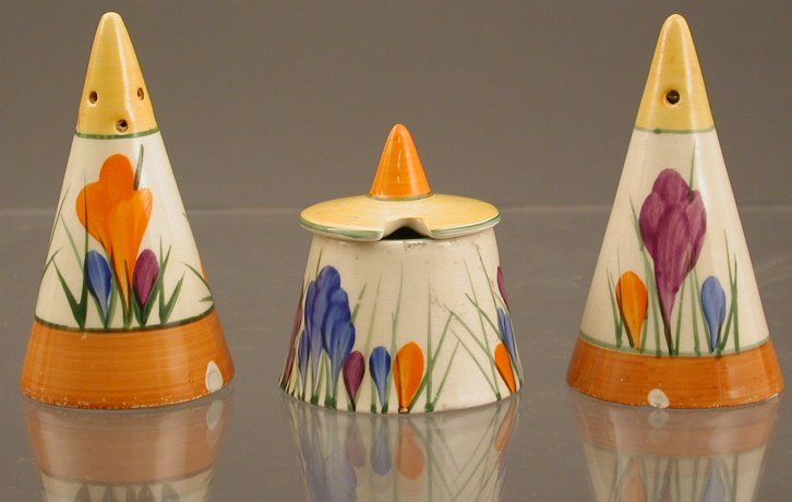 A Clarice Cliff three piece cruet set