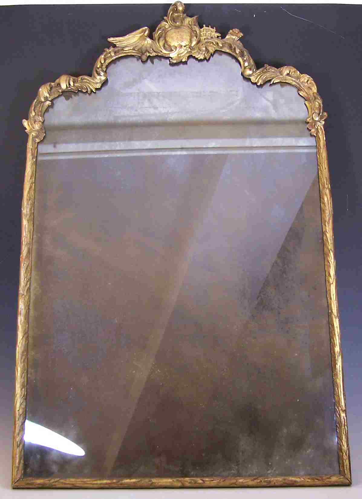 A 19th century giltwood framed wall mirror,