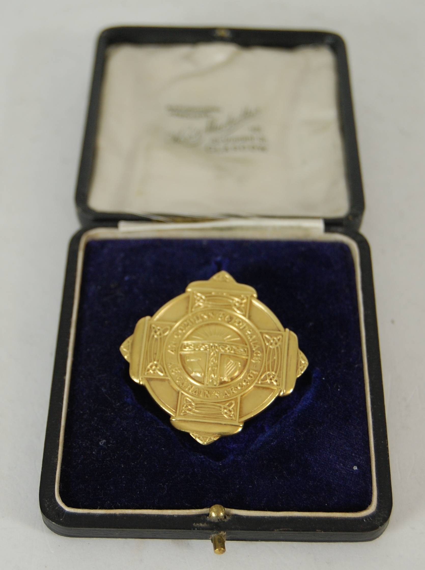 A 9ct gold Gaelic MOD medal