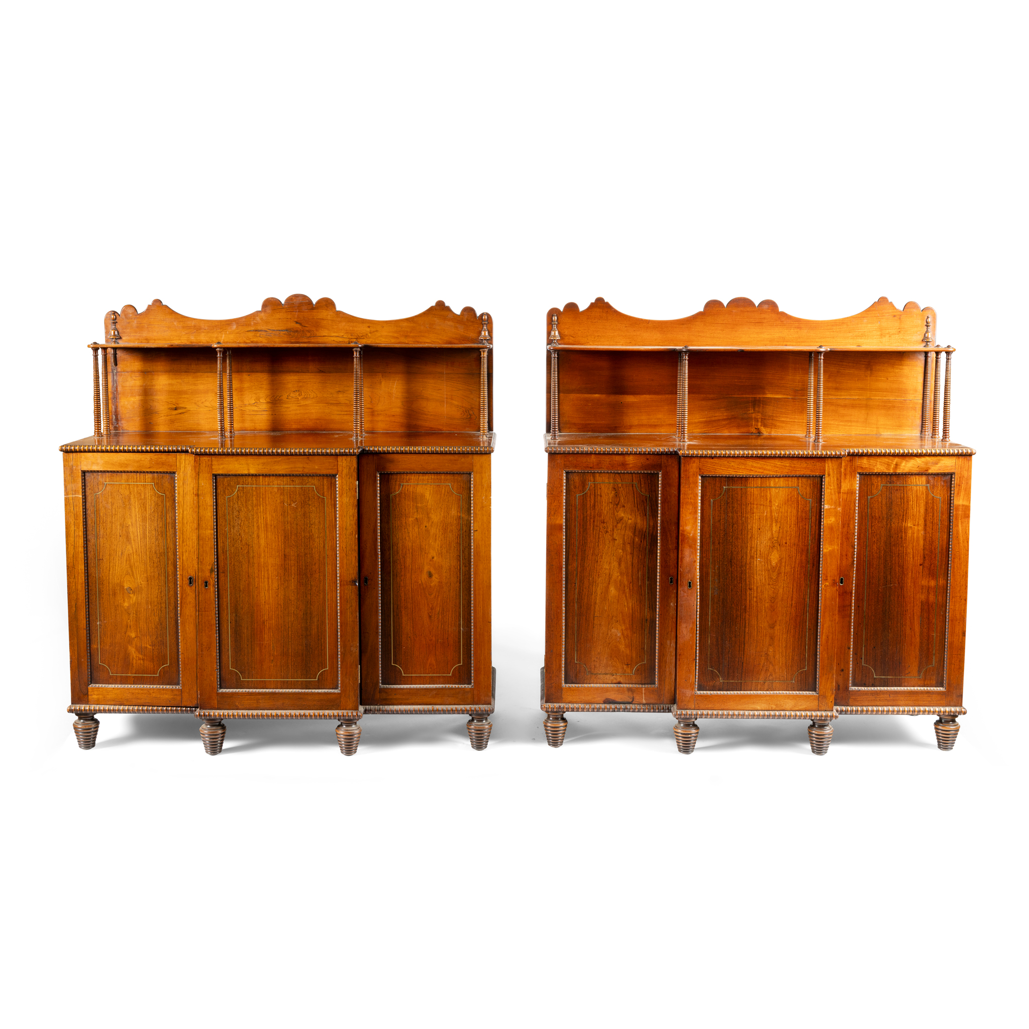A PAIR OF WILLIAM IV ROSEWOOD BREAKFRONT SIDECABINETS