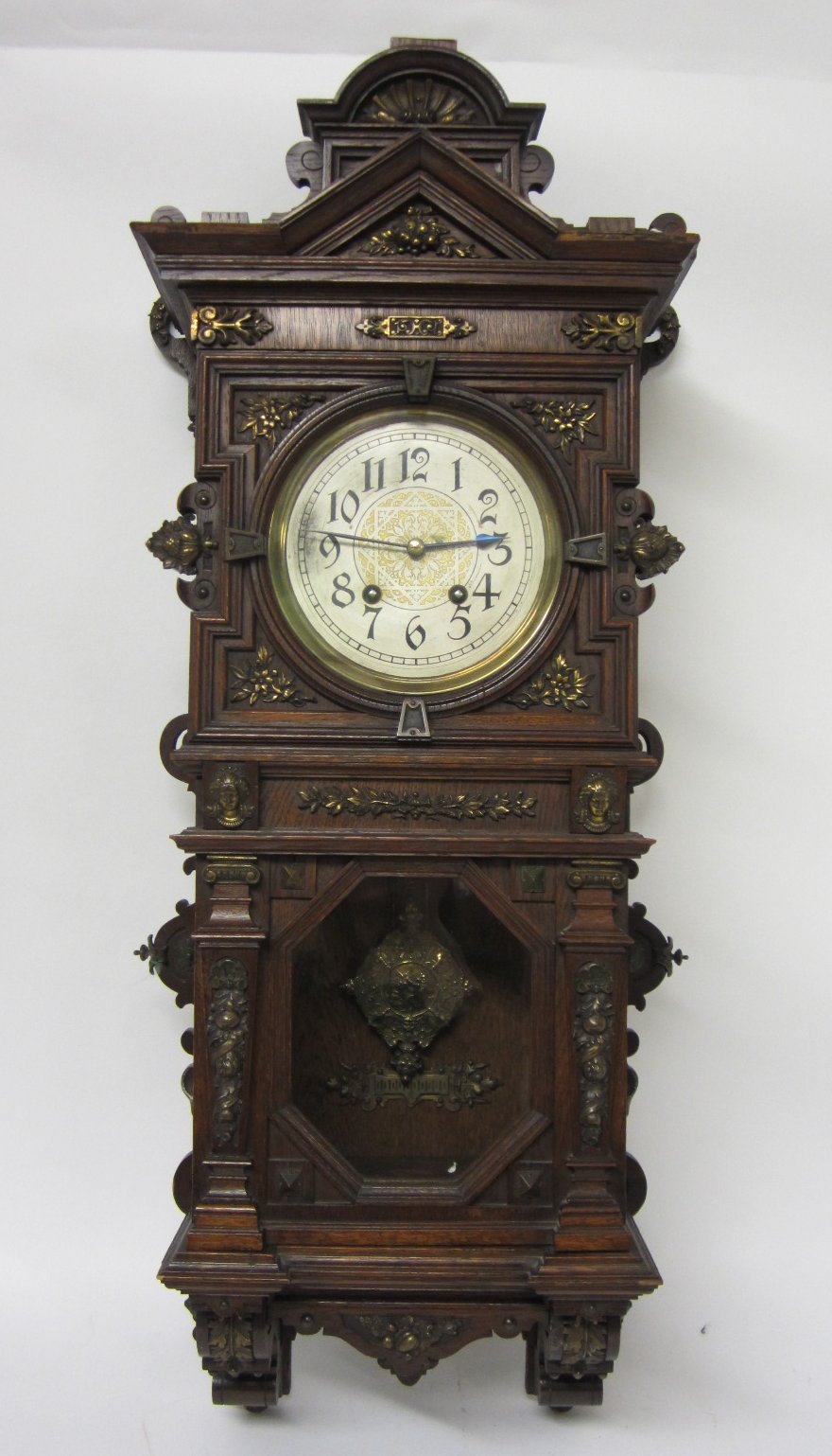 BRASS MOUNTED OAK WALL CLOCK