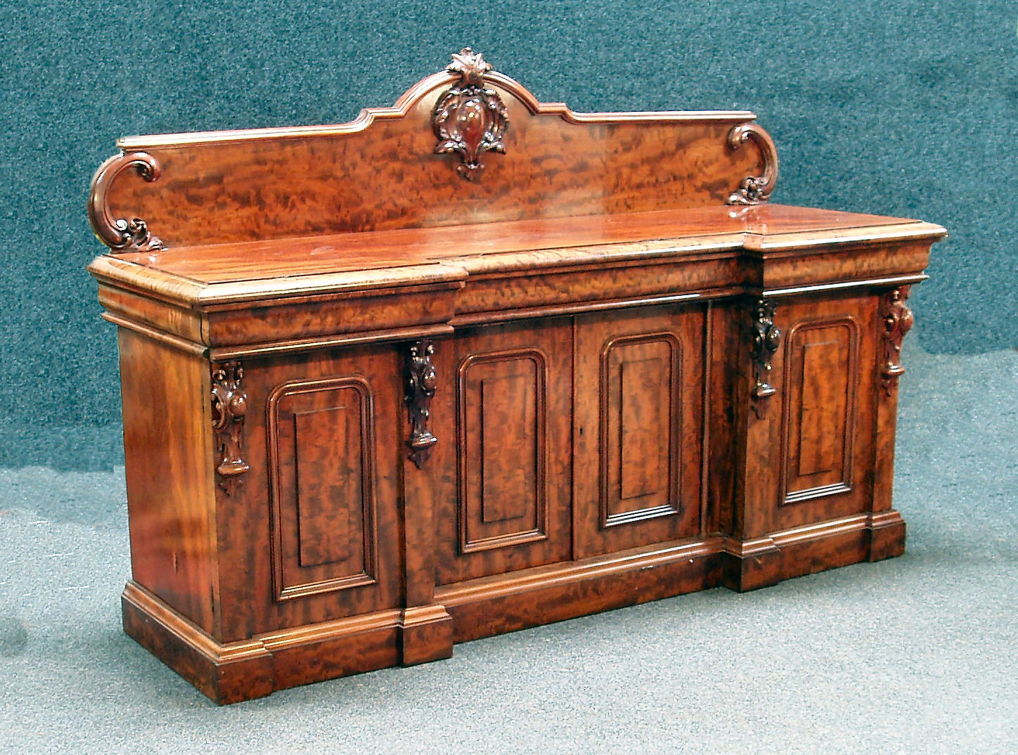 A Victorian mahogany inverted breakfront sideboard By Wylie and Lochead, Buchanan street, Glasgow '5670'