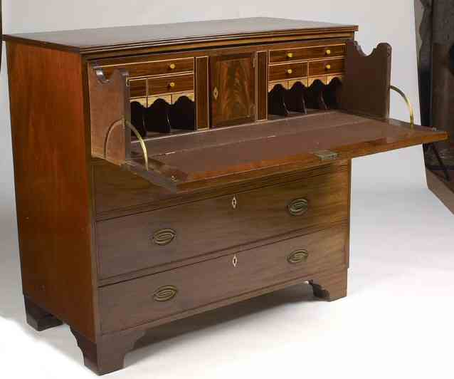 A late George III period mahogany secretaire chest