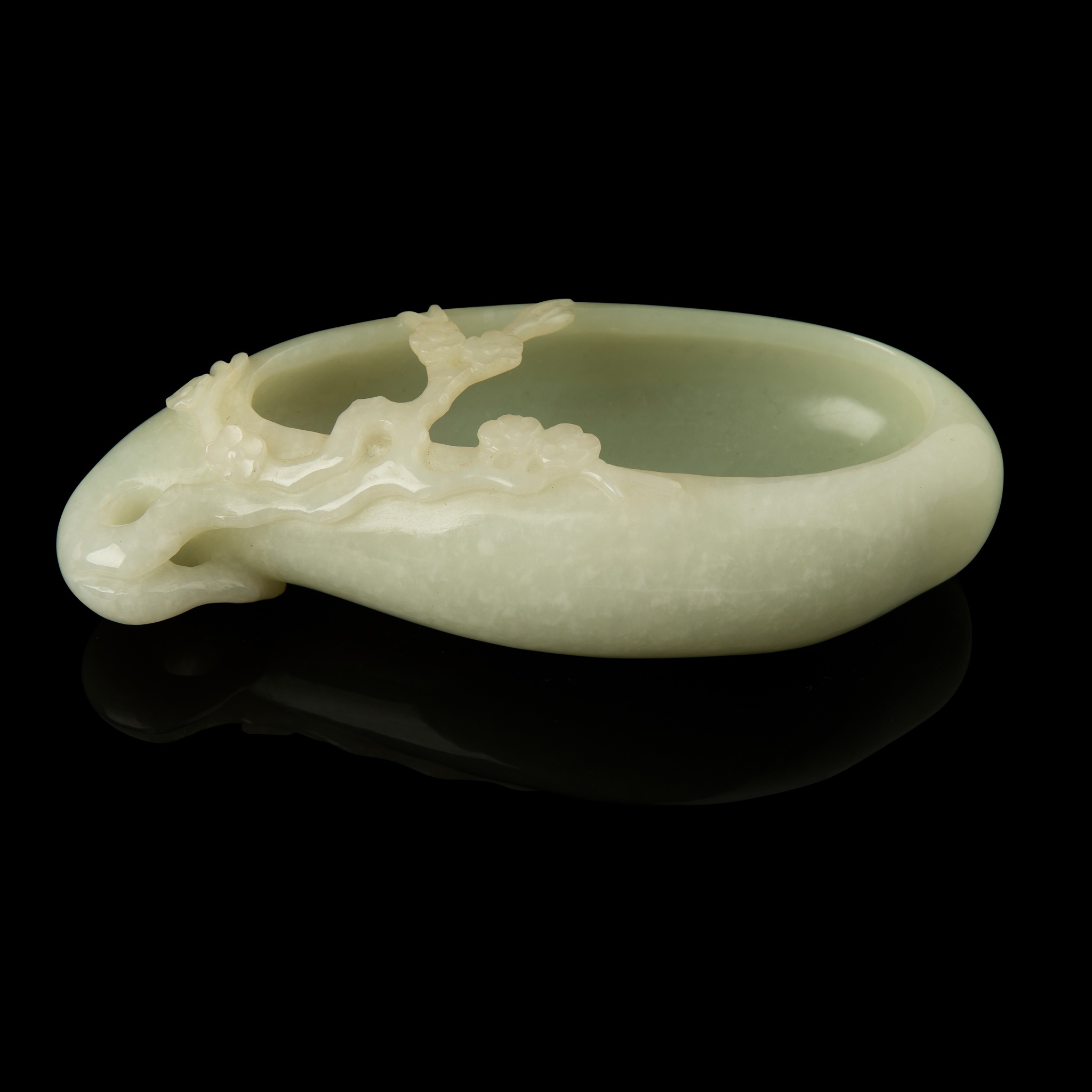 Past auction: PALE CELADON JADE 'PRUNUS' BRUSH WASHER QING