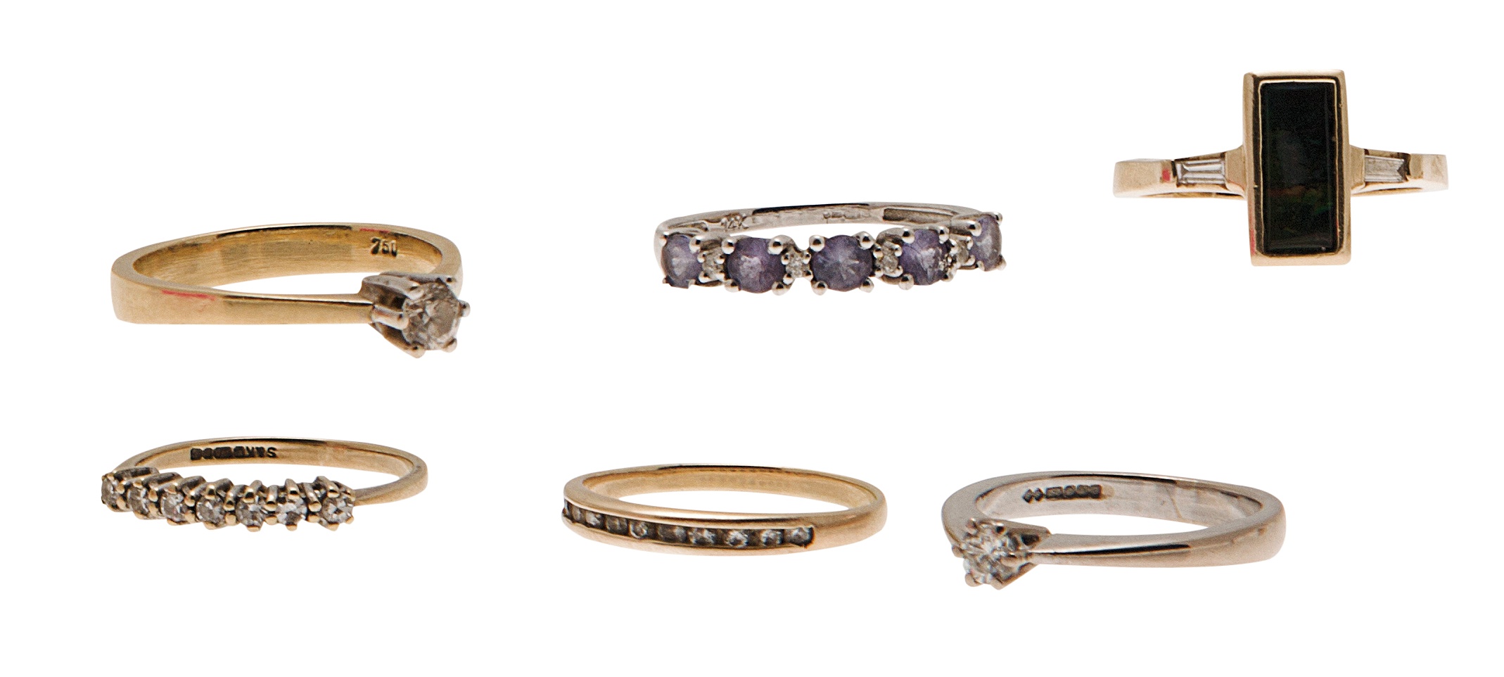 A group of diamond and other gem set rings