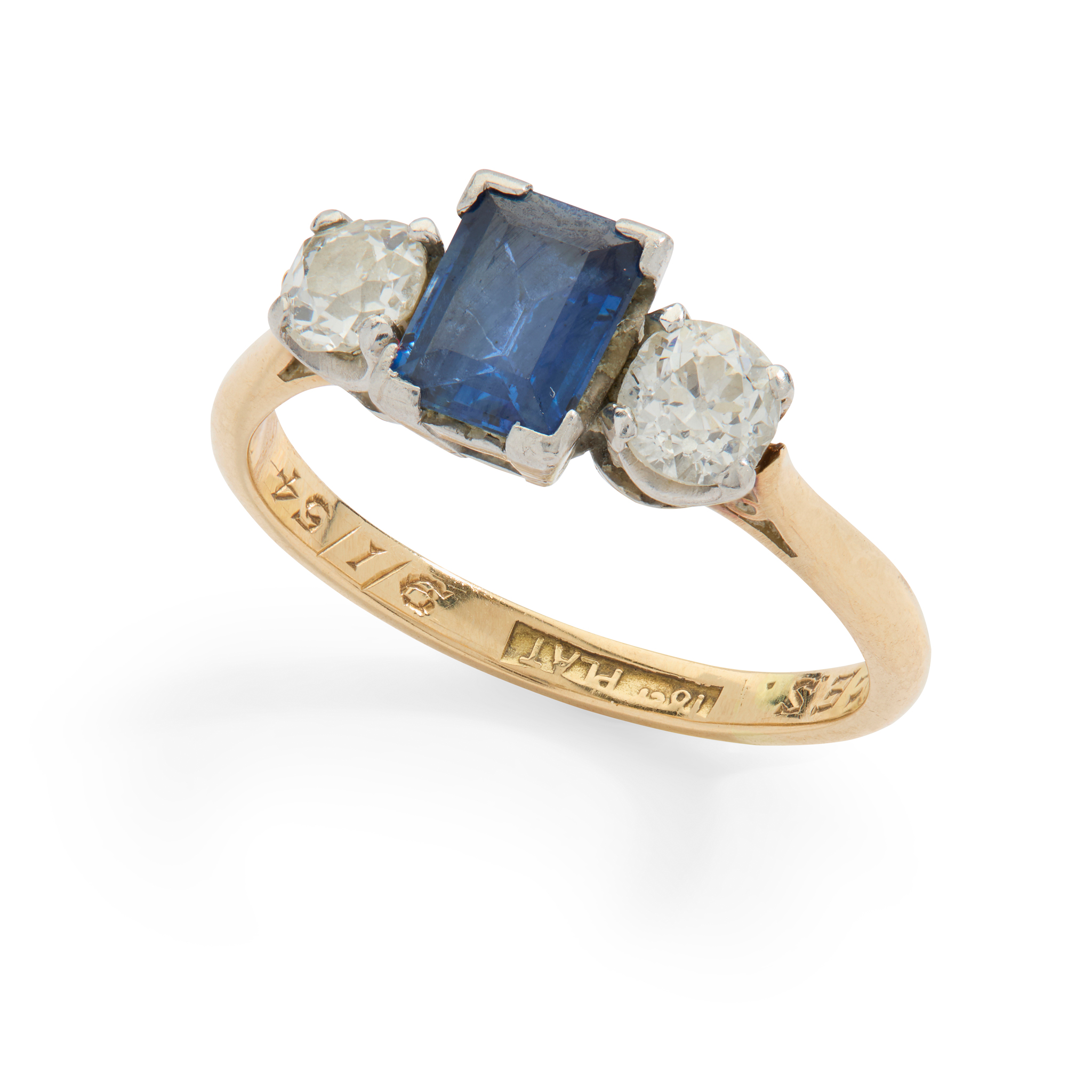 A sapphire and diamond three-stone ring