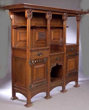 A large Arts and Crafts oak sideboard by Wylie & Lochhead, Glasgow