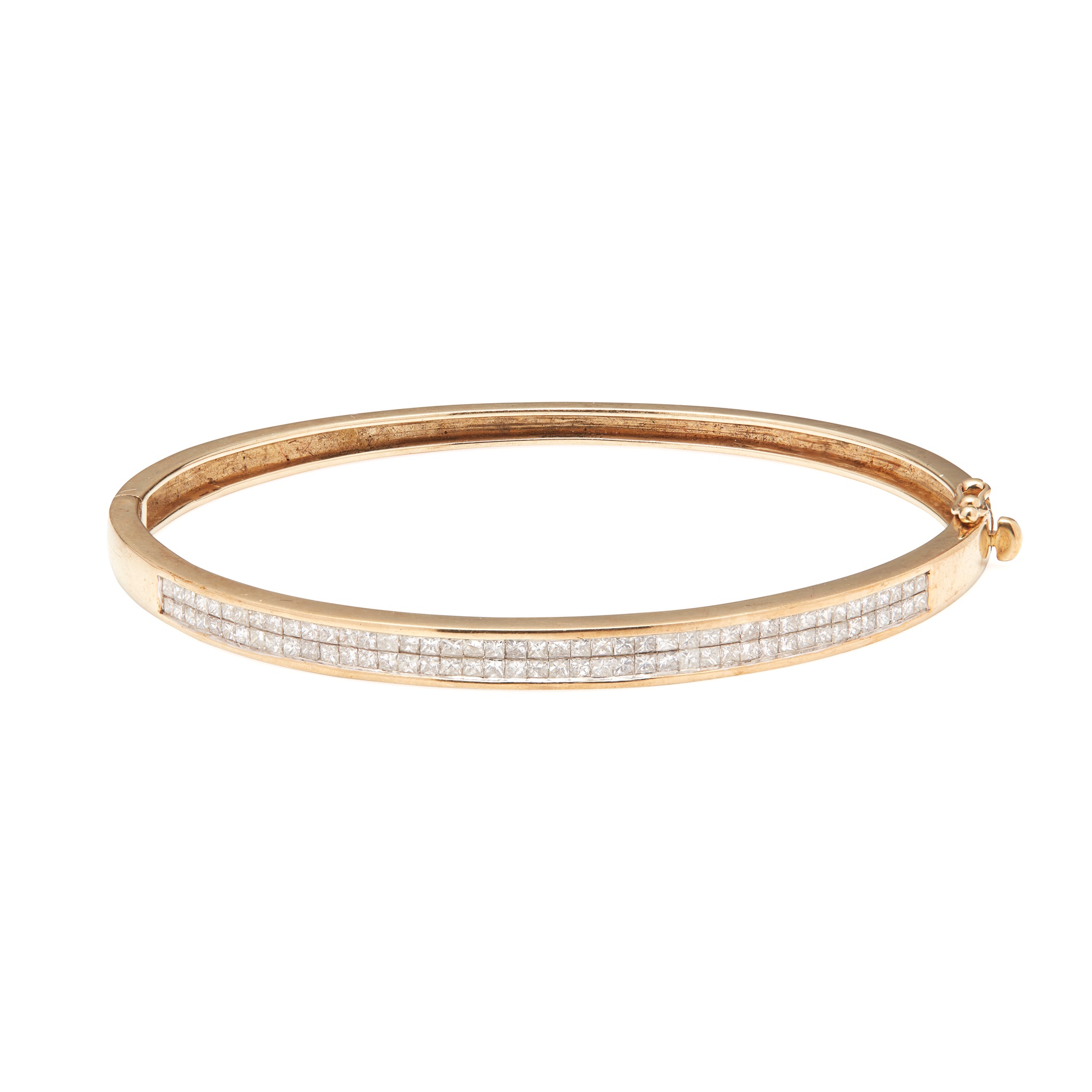 A 9ct gold diamond set bangle