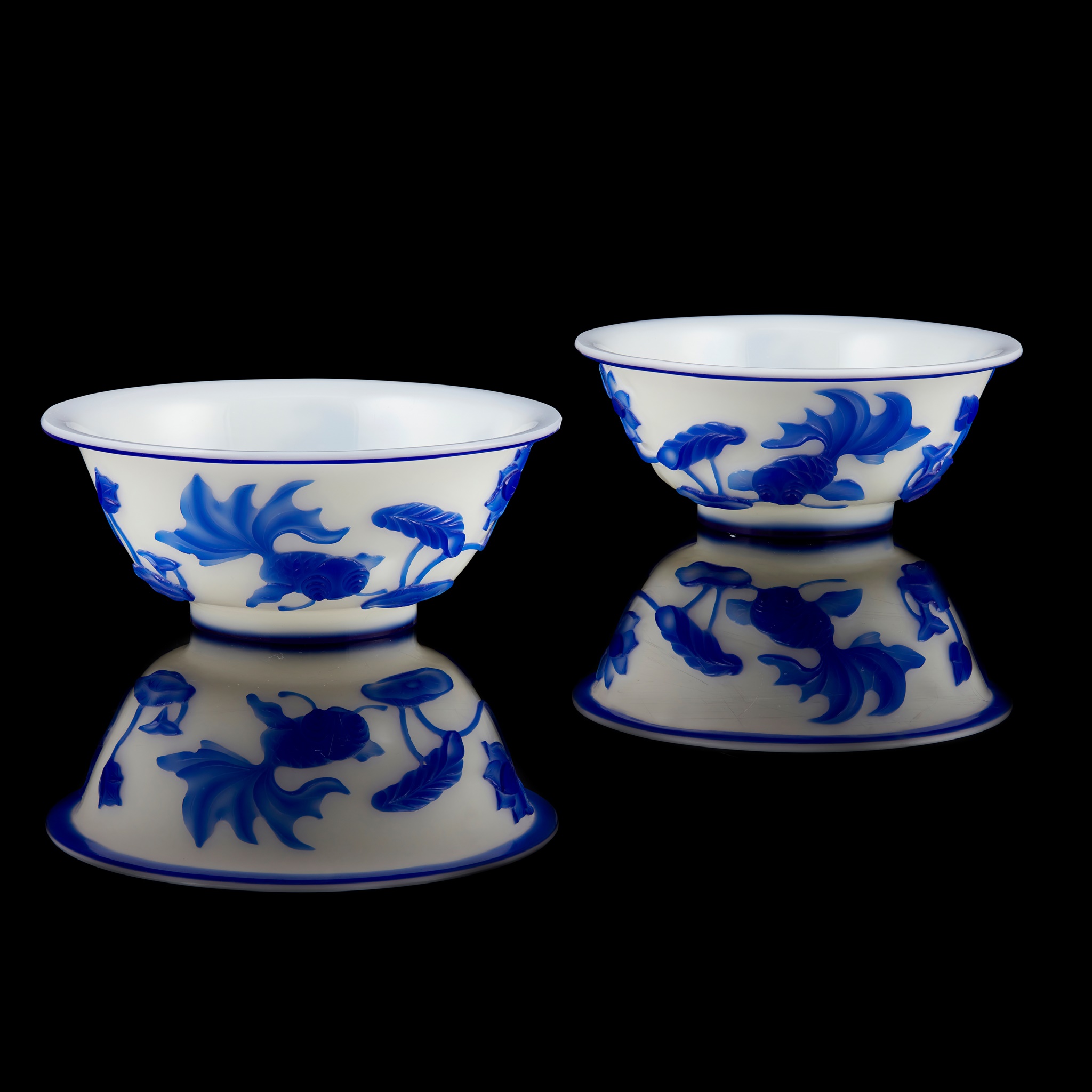 PAIR OF BLUE-OVERLAY WHITE PEKING GLASS BOWLS