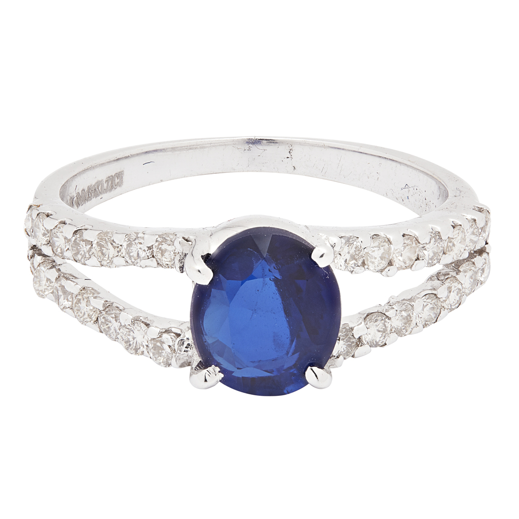 A sapphire and diamond set ring