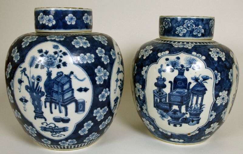A matched pair of 19th century Chinese blue and white ginger jars and covers