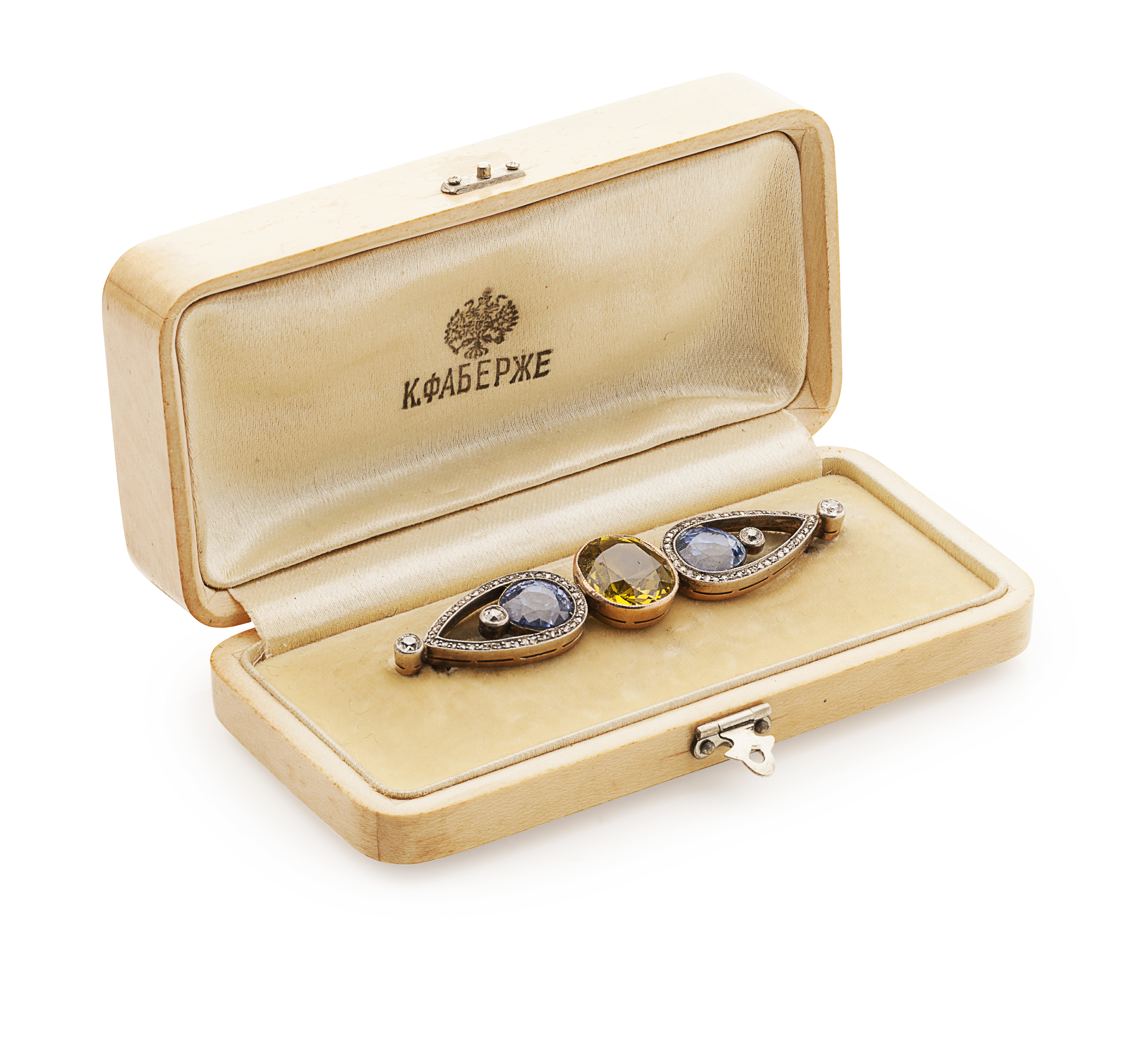 FABERGÉ - A diamond and sapphire set brooch