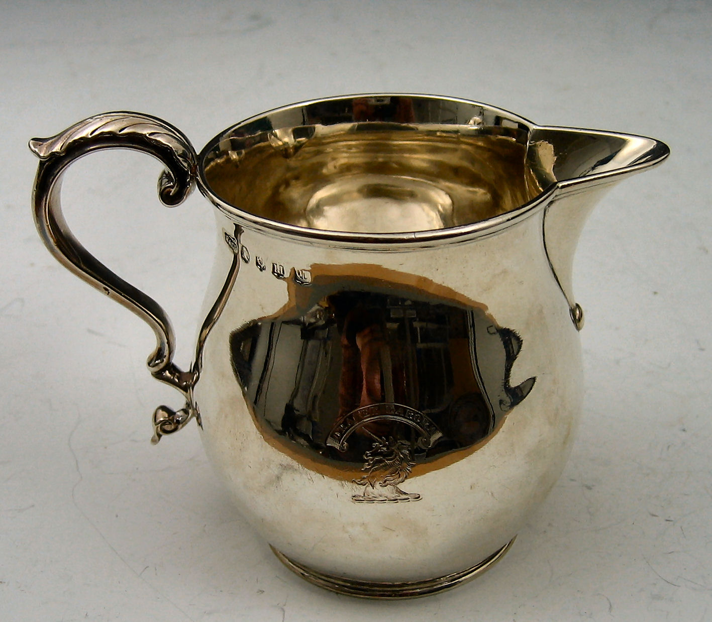 A William IV Scottish baluster form jug,