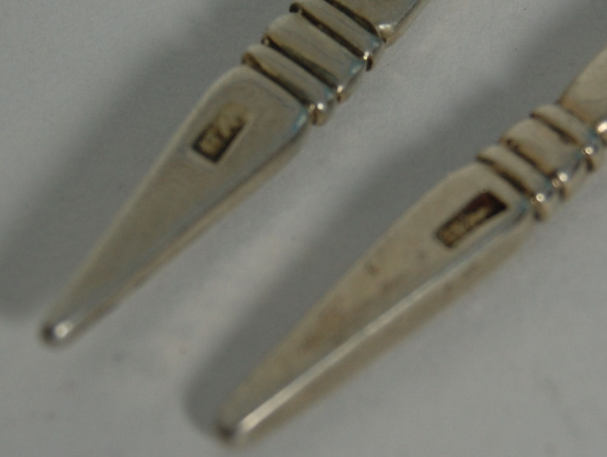 Aberdeen / Banff - an unusual pair of Scottish provincial twisted stem masking spoons