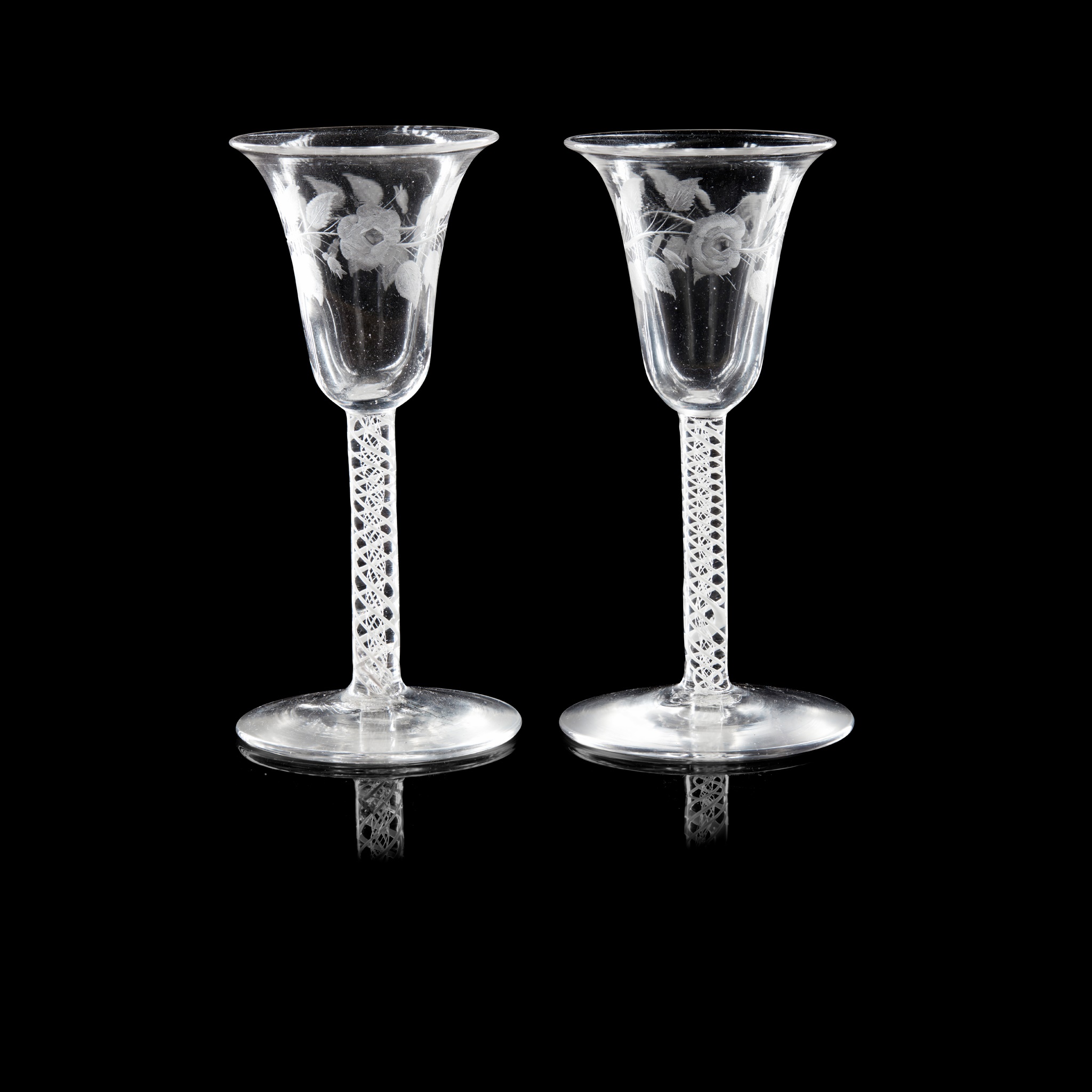 A NEAR PAIR OF JACOBITE STYLE GLASSES
