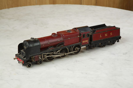 A tinplate clockwork model of a locomotive