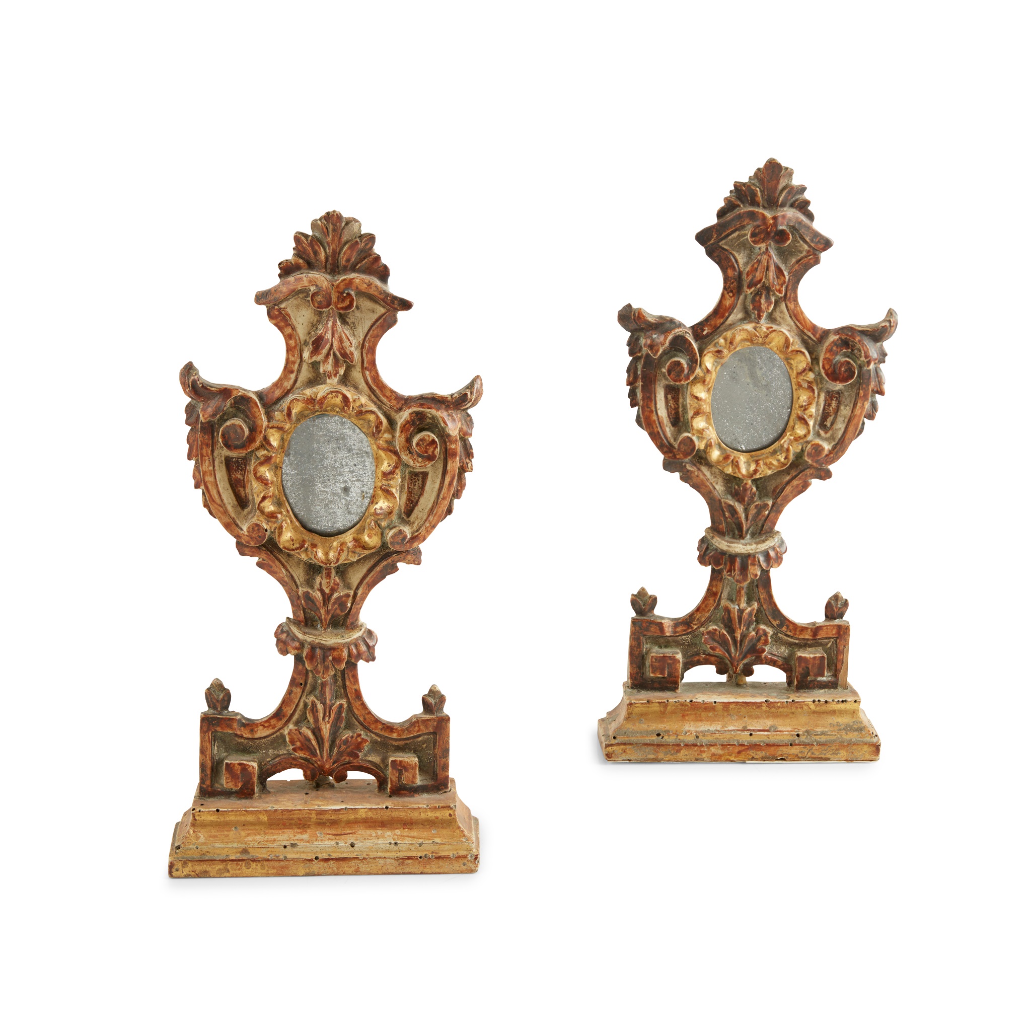 PAIR OF SPANISH BAROQUE PAINTED AND PARCEL-GILT RELIQUARIES