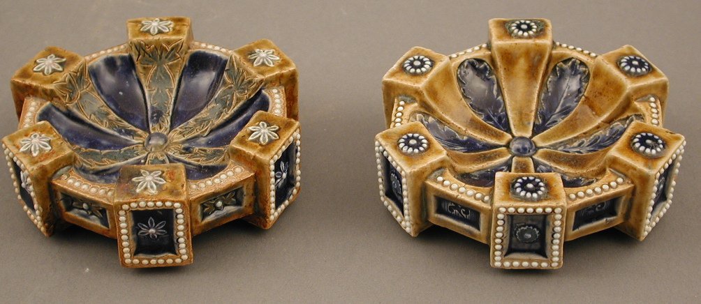 A near pair of Doulton Lambeth stoneware salts