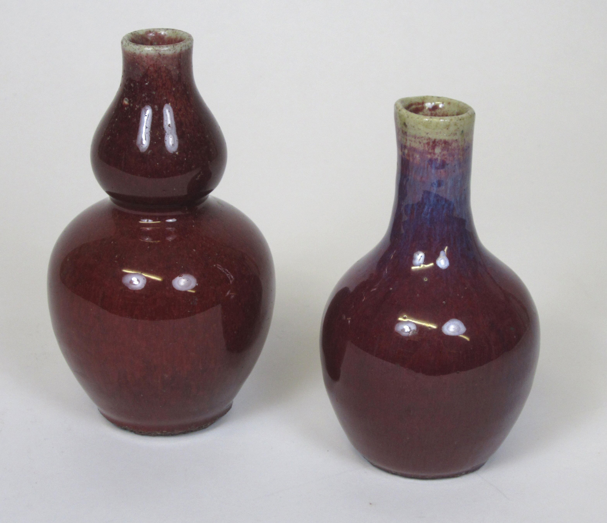 TWO CHINESE SANG DE BOEUF STONEWARE VASES