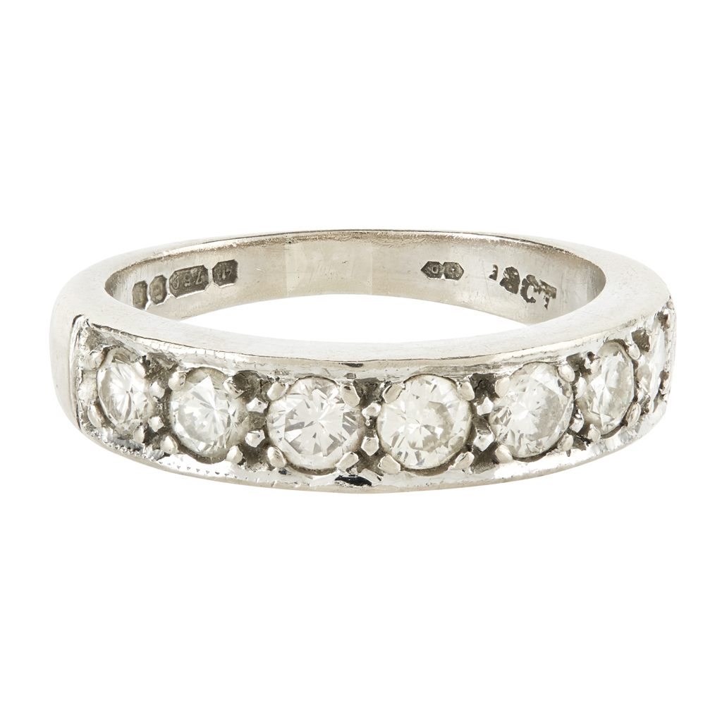 A diamond set half eternity ring