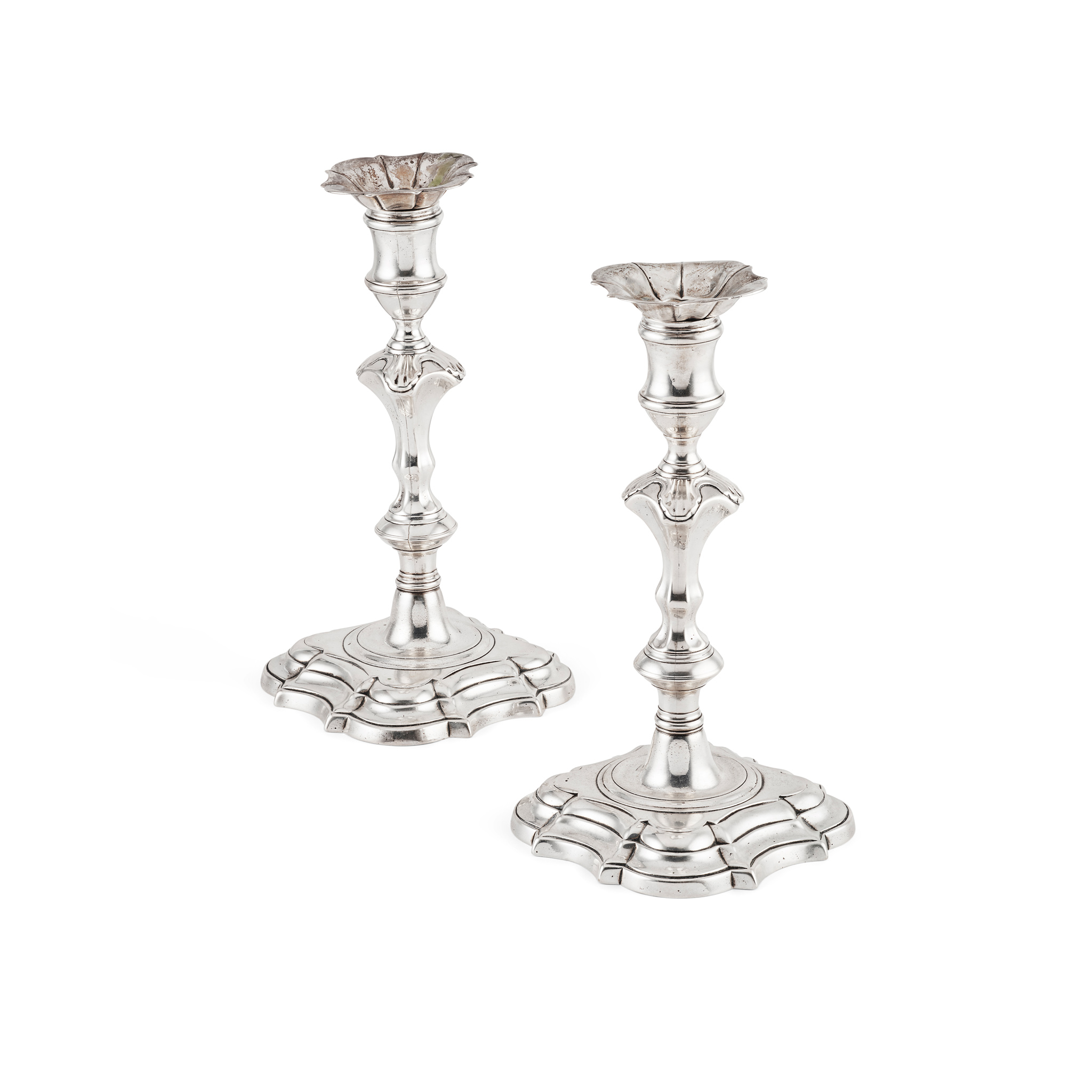 A PAIR OF GEORGE II CAST CANDLESTICKS