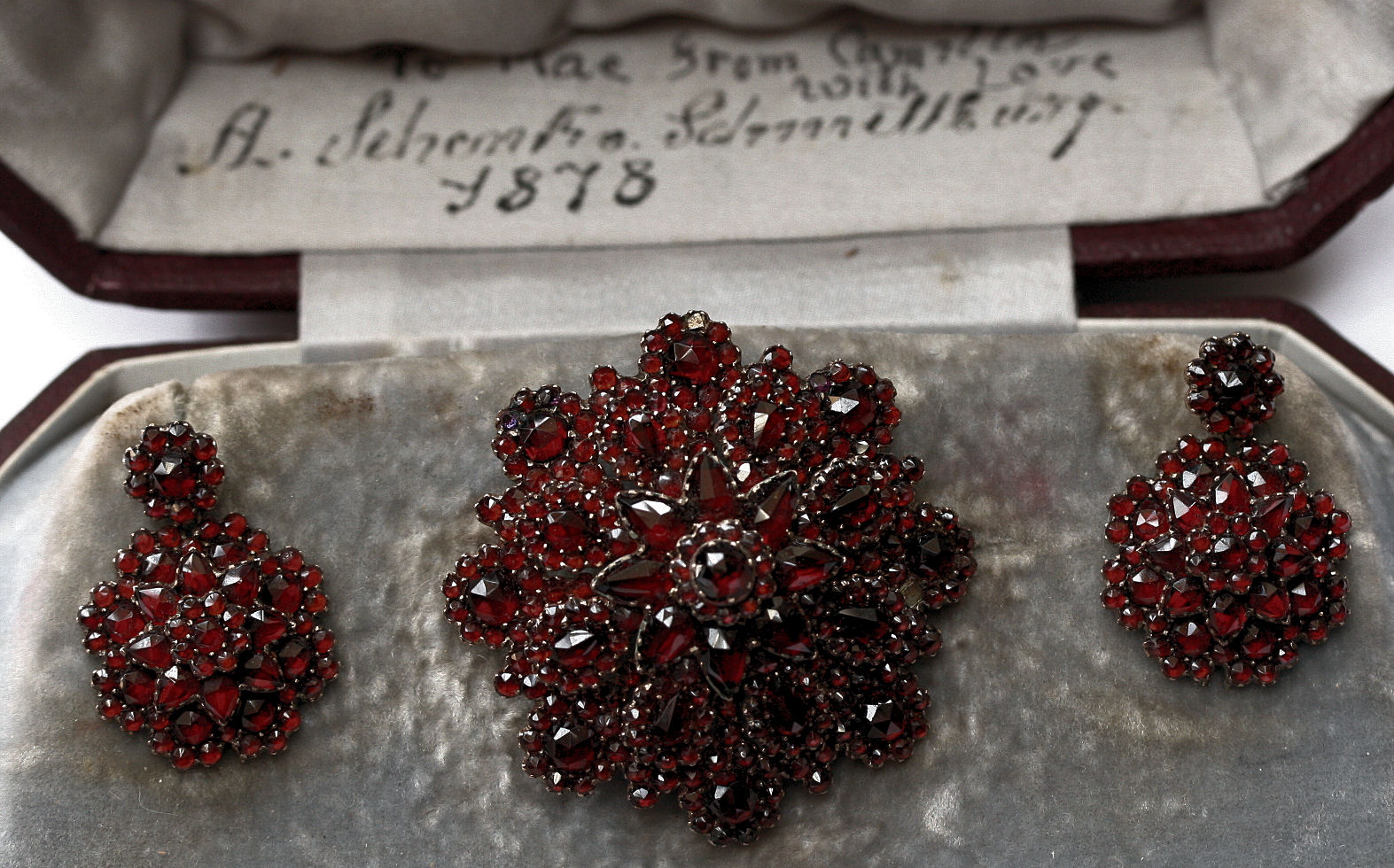 A late 19th century Bohemian garnet set demi-parure