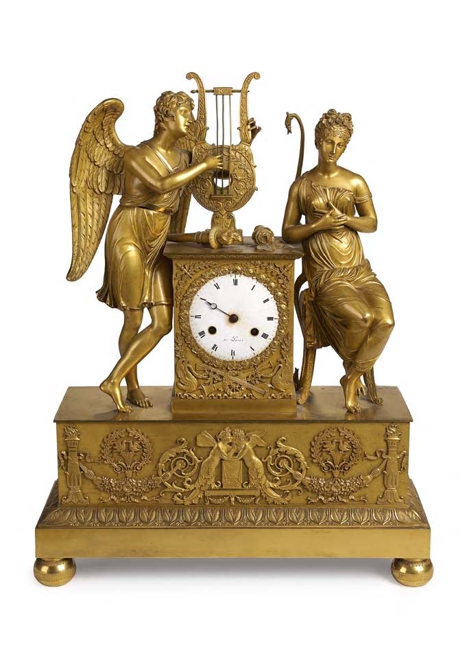 A French Empire gilt brass mantel clock,