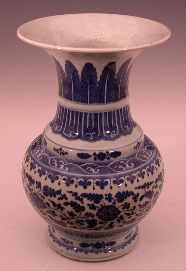 A Chinese underglaze blue decorated vase of transitional shape,
