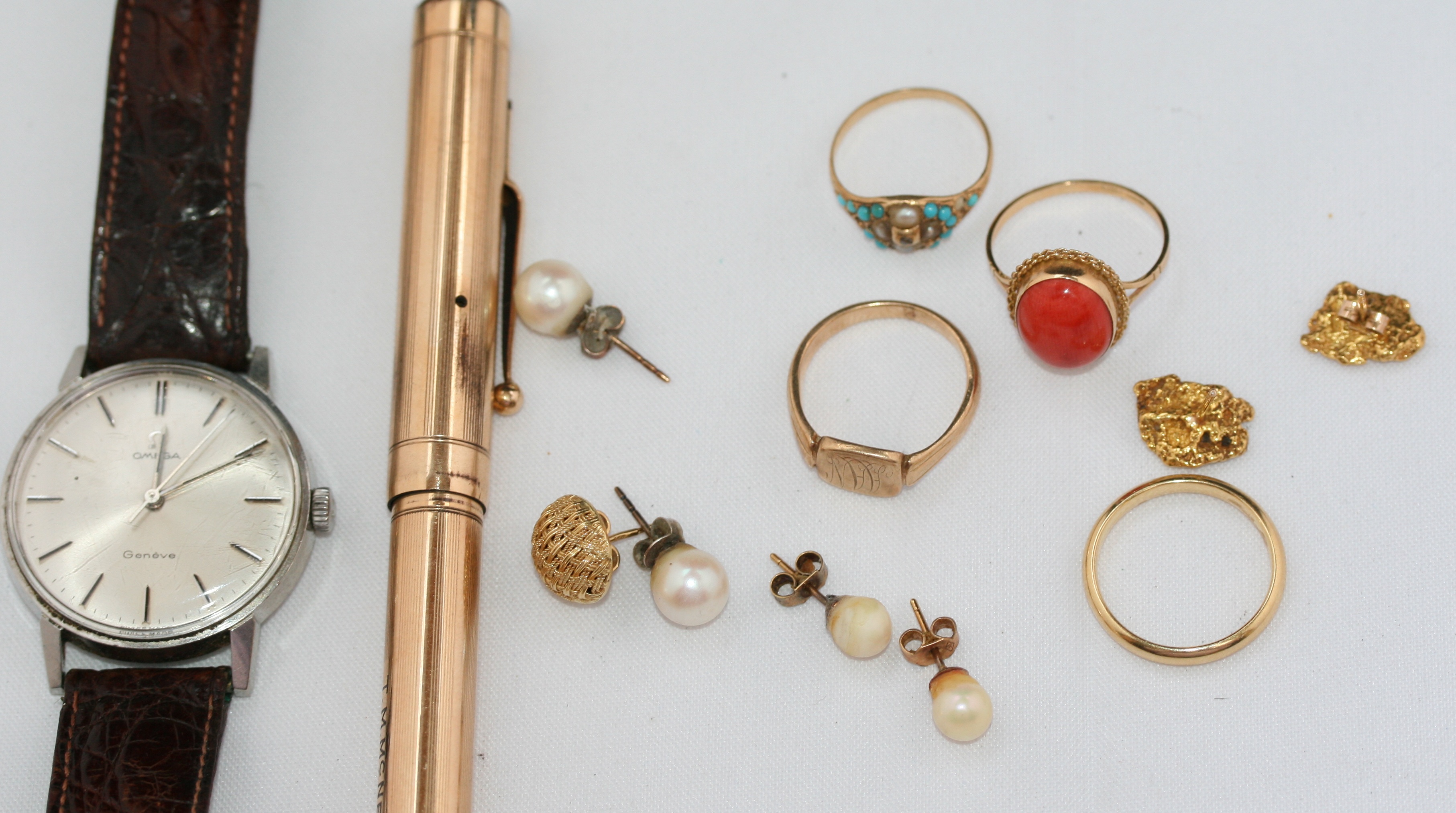 A group of gold and gem set jewellery to include;