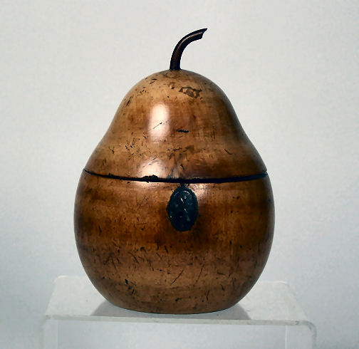 A 19th century fruitwood pear caddy