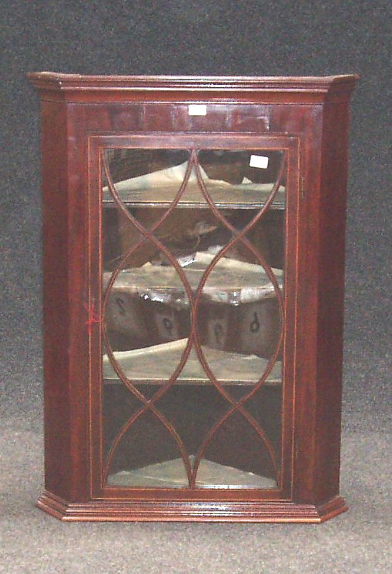 A 19th century mahogany and line inlaid hanging cabinet,