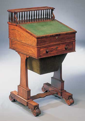 A Regency rosewood Davenport work table