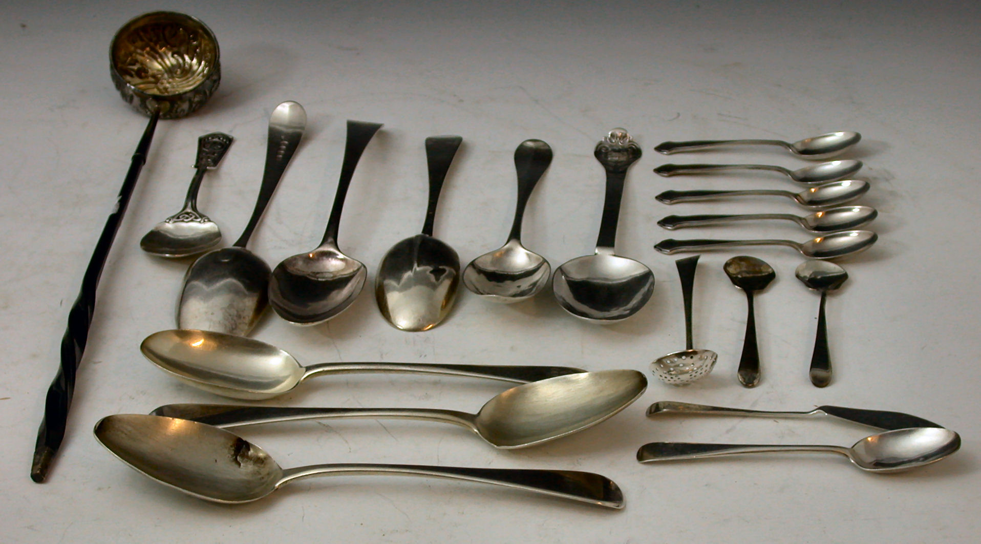 A Charles II Lace Back Trefid table spoon,