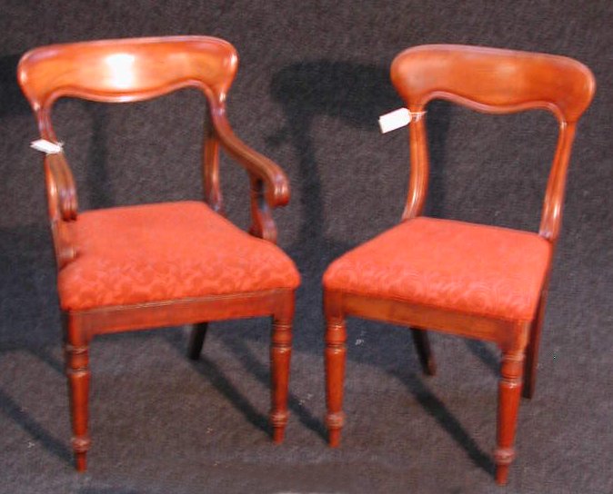 A set of five mahogany dining chairs,