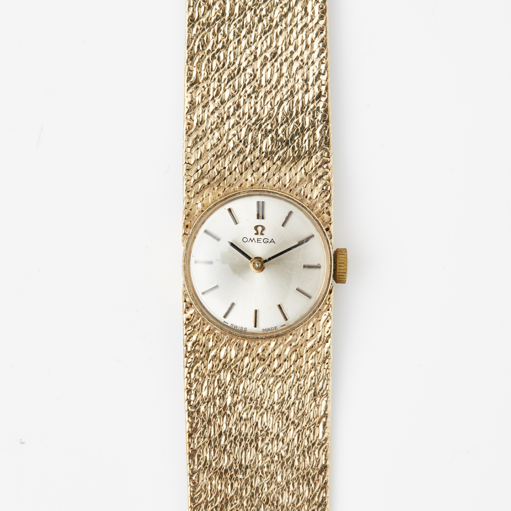 OMEGA - A lady's 9ct gold wrist watch