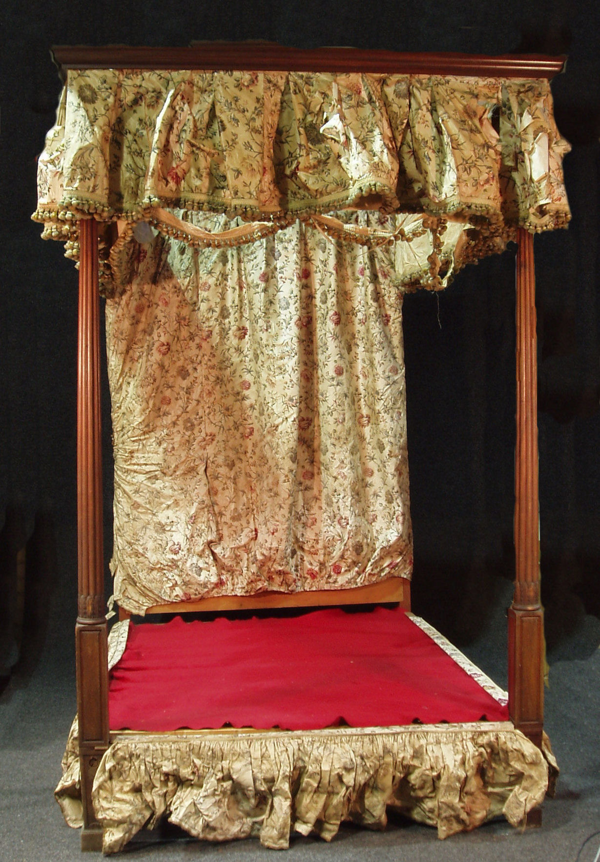 A 19th century four poster bed