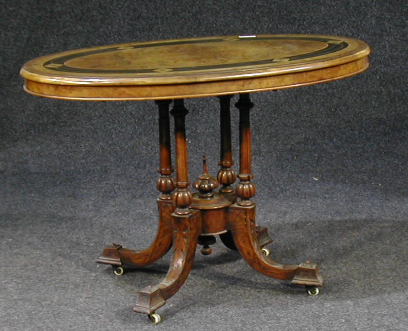A Victorian walnut inlaid centre table,