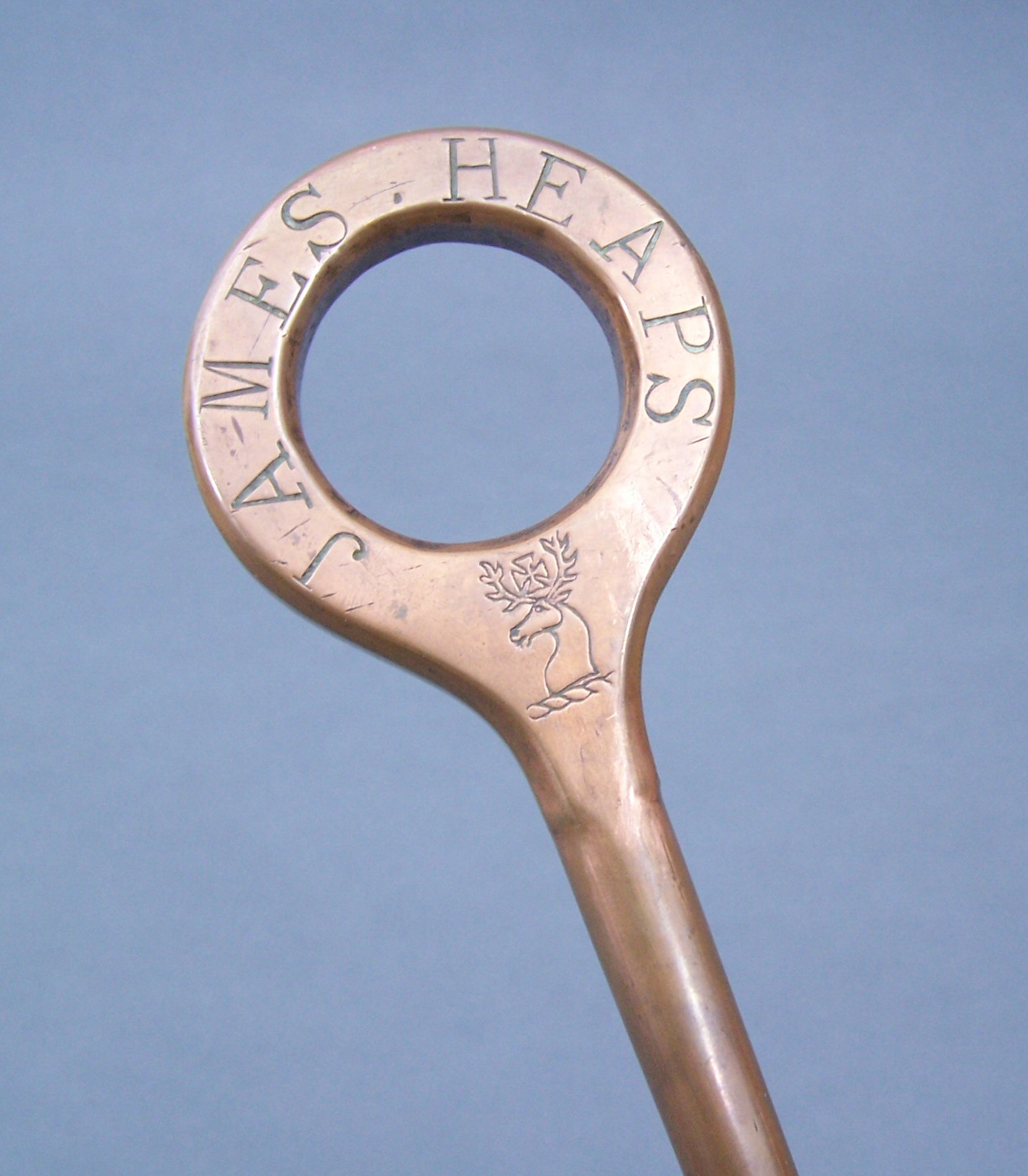 A copper ullage stick,