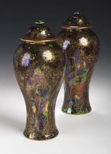 A pair of Wedgwood black 'Fairyland' lustre vases and covers,